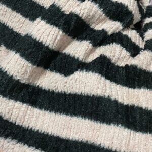 Jumper in a soft rib knit containing some wool. Relaxed fit with a high collar